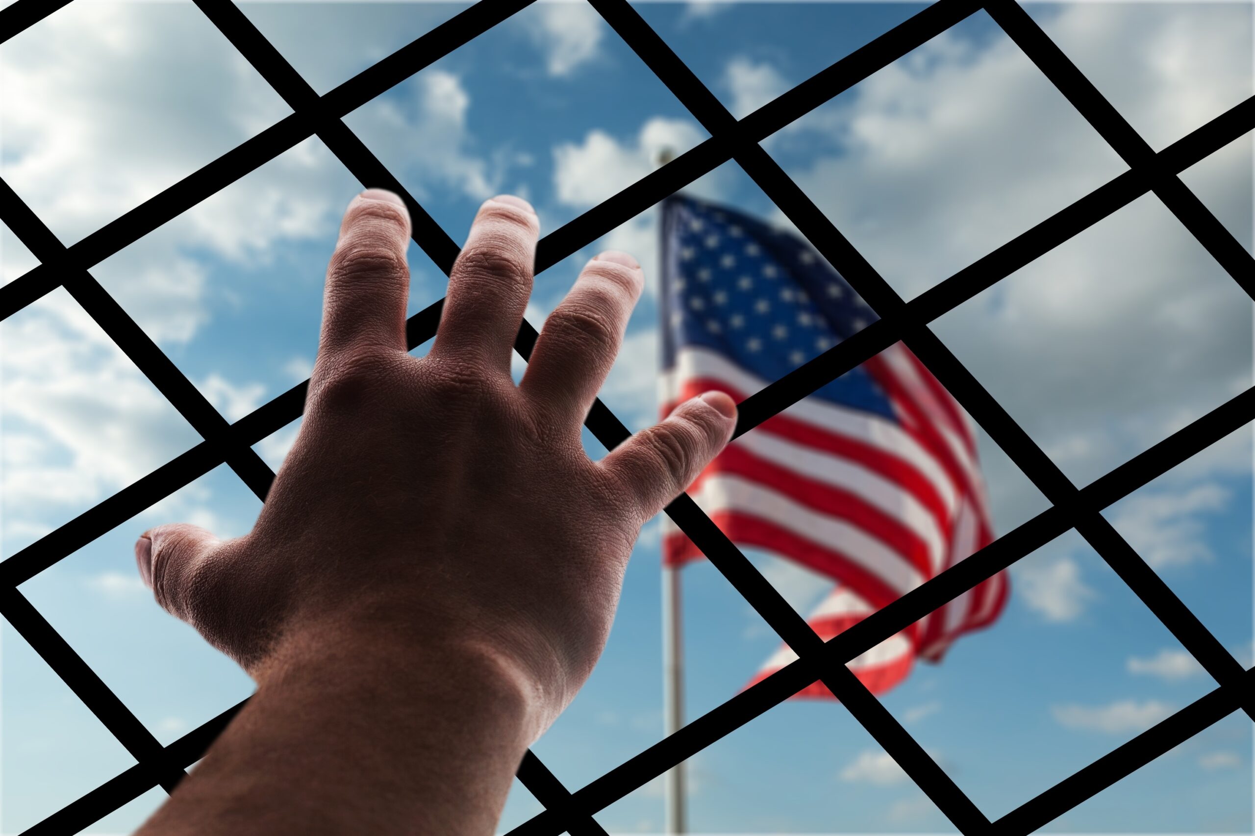 American flag through wire mesh, deportation concept